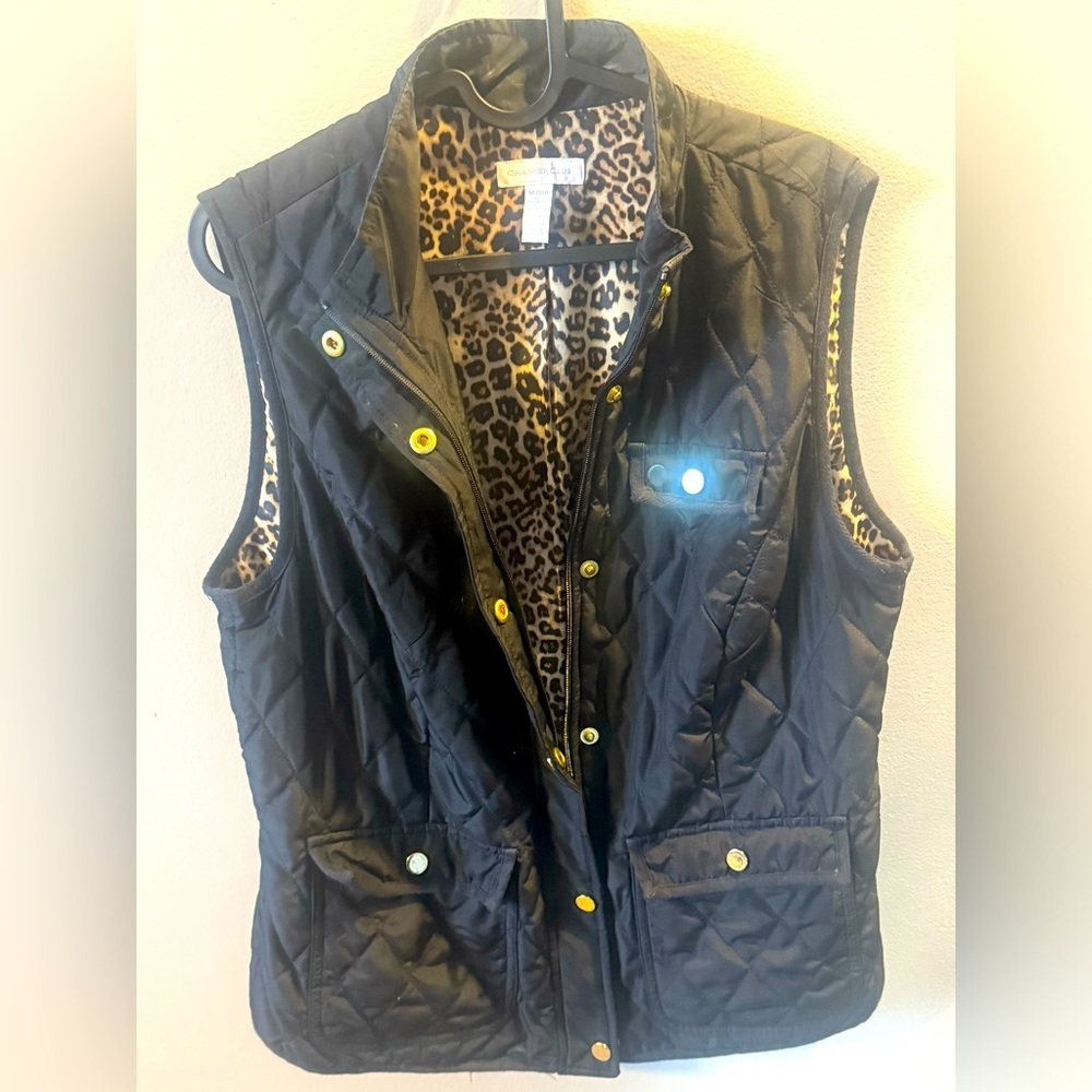 Black, charter club vest, black on the outside cheetah print on the inside.